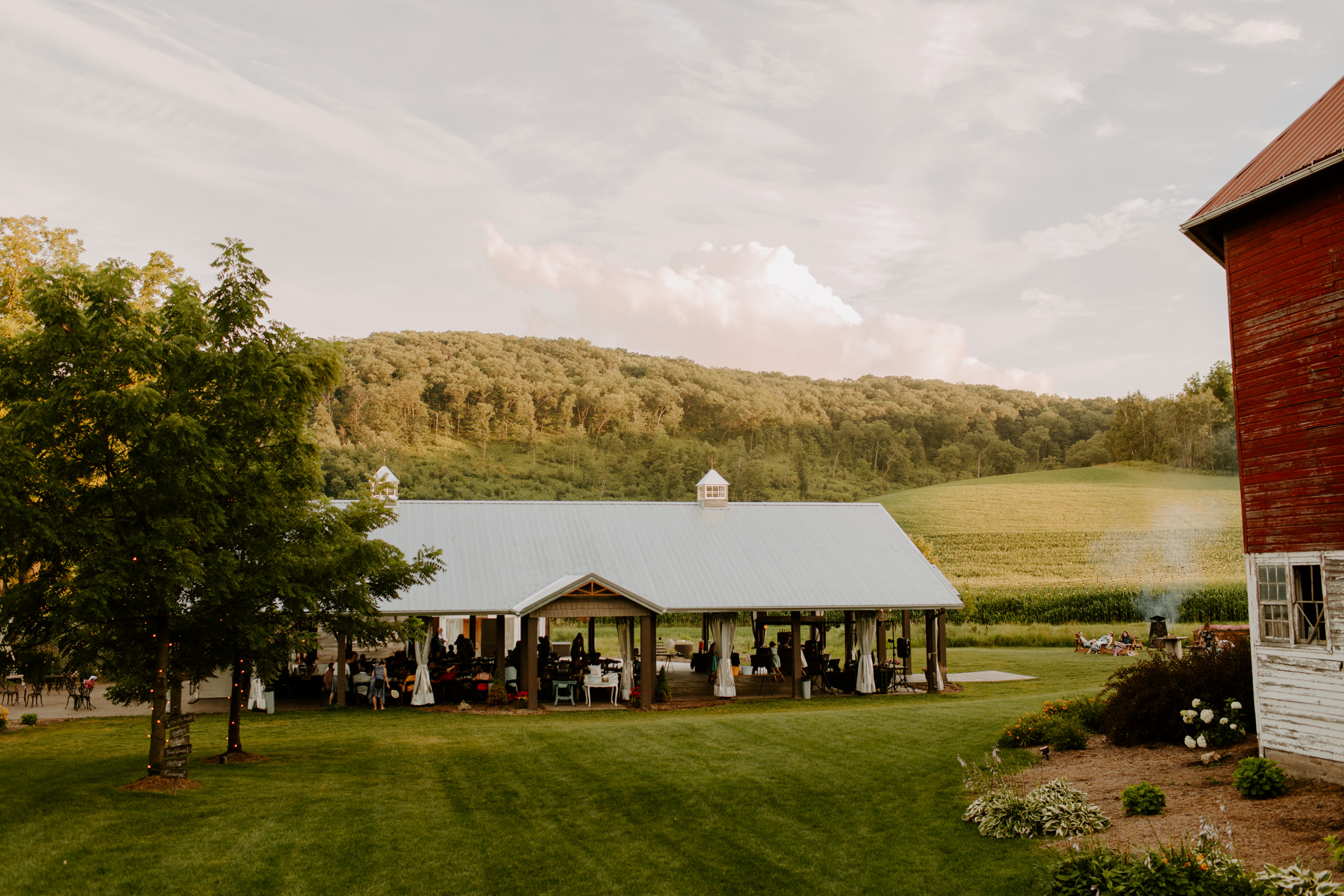 Summer evening reception at Hidden Meadown Barn in Pepin Wisconsin photographed by Skyler and Vhan